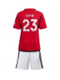 Otroški Nogometna dresi replika Manchester United Luke Shaw #23 Domači 2023-24 Kratek rokav (+ hlače)